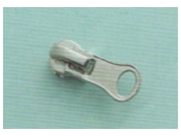 Cursor de cremalleras metálicas