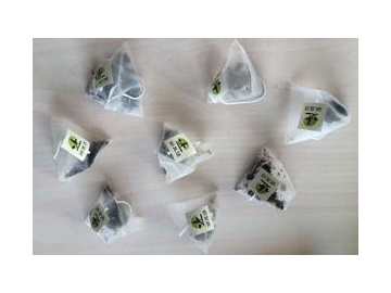 Máquina llenadora y selladora de bolsas de té en forma de pirámide
