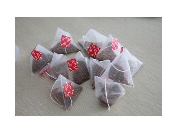 Máquina llenadora y selladora de bolsas de té en forma de pirámide