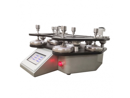Máquina de prueba de resistencia a la abrasión y frisado  (Equipo de ensayo Nu-Martindale)