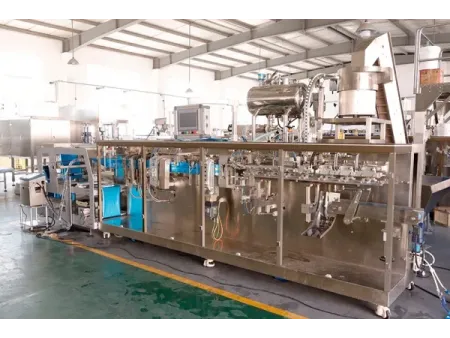 Envasadora horizontal de bolsas stand up con boquilla, llenado con 1 boquilla