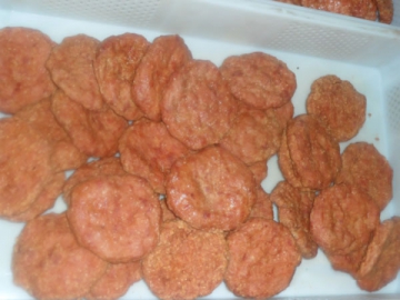 Producción de pepitas de pollo y hamburguesas